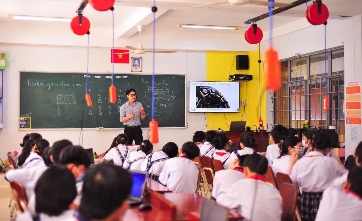 Teacher with students in a classroom